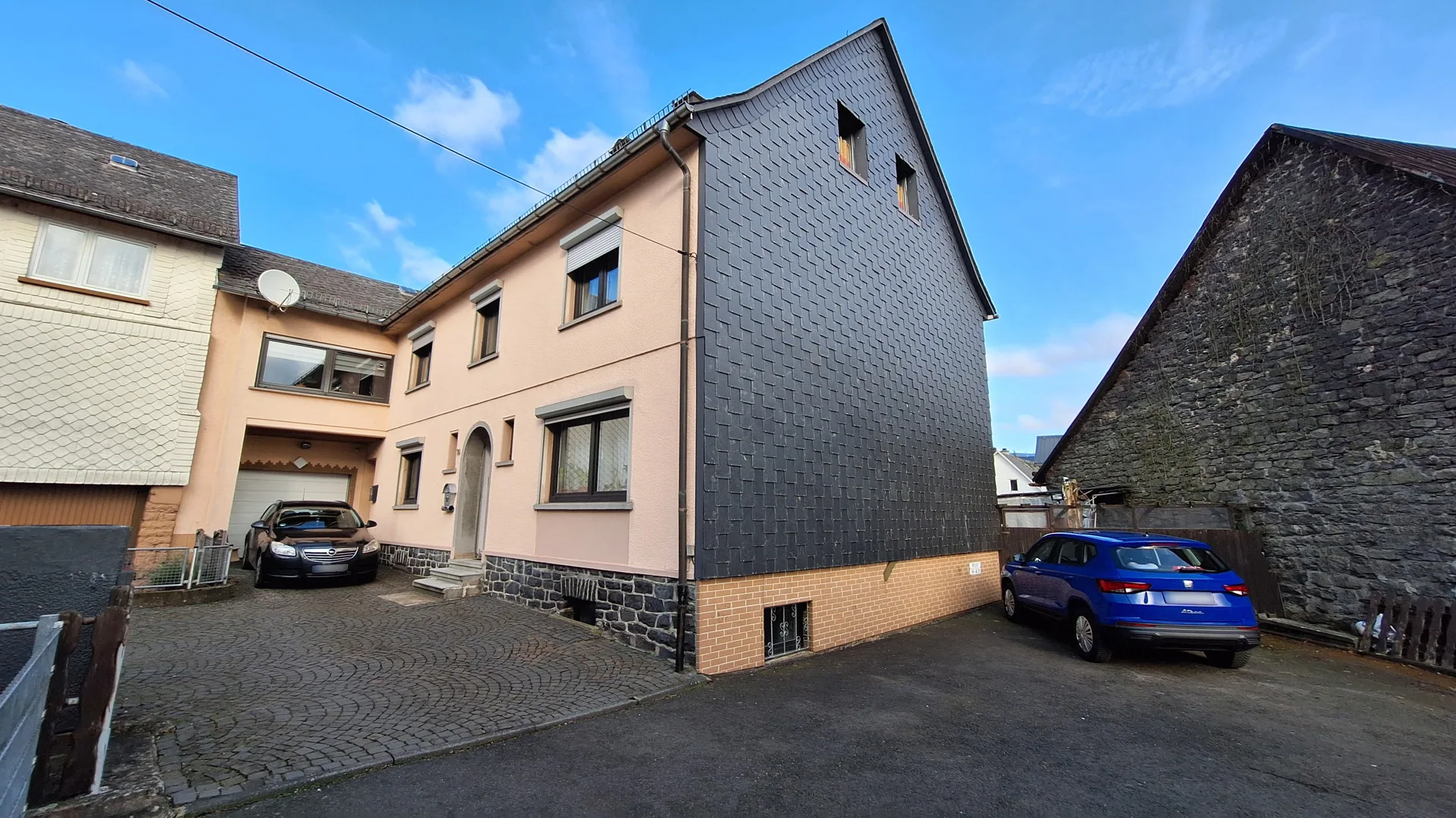 Solides Doppelhaus mit Ladenlokal in zentraler Lage in Rennerod!